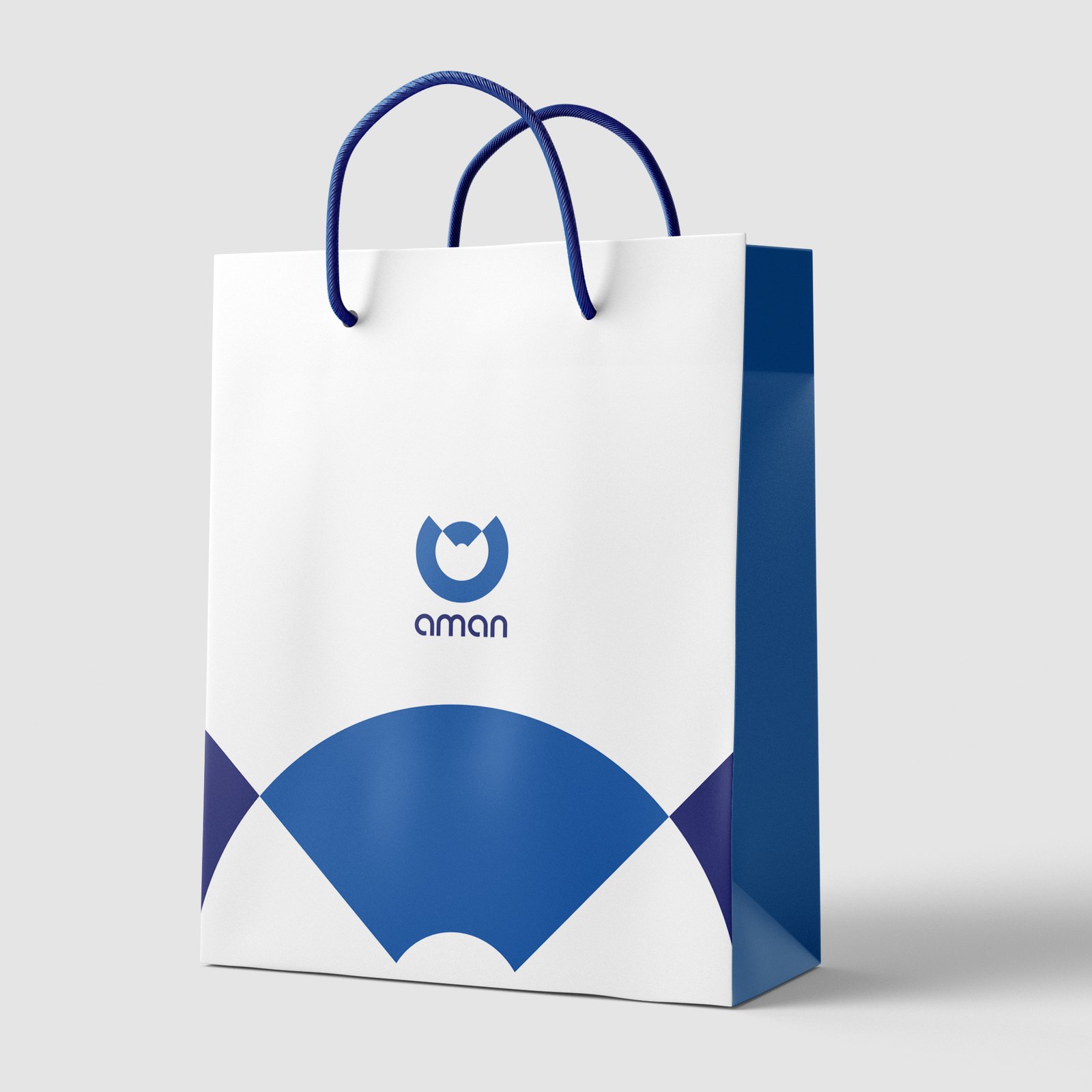 Aman logo printed on a retail shopping bag