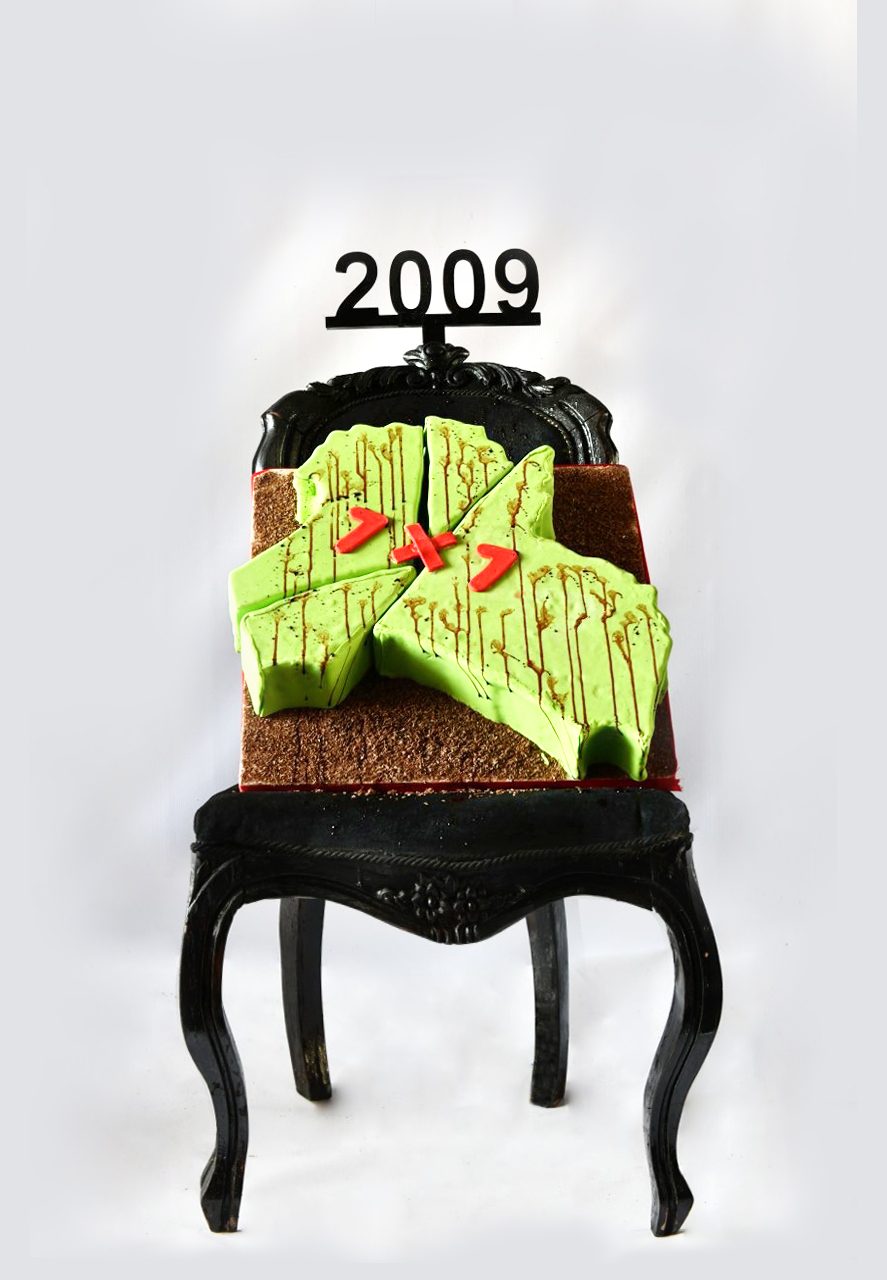 1 of 16, 2009. The map itself, cracked and bleeding along old fault lines.