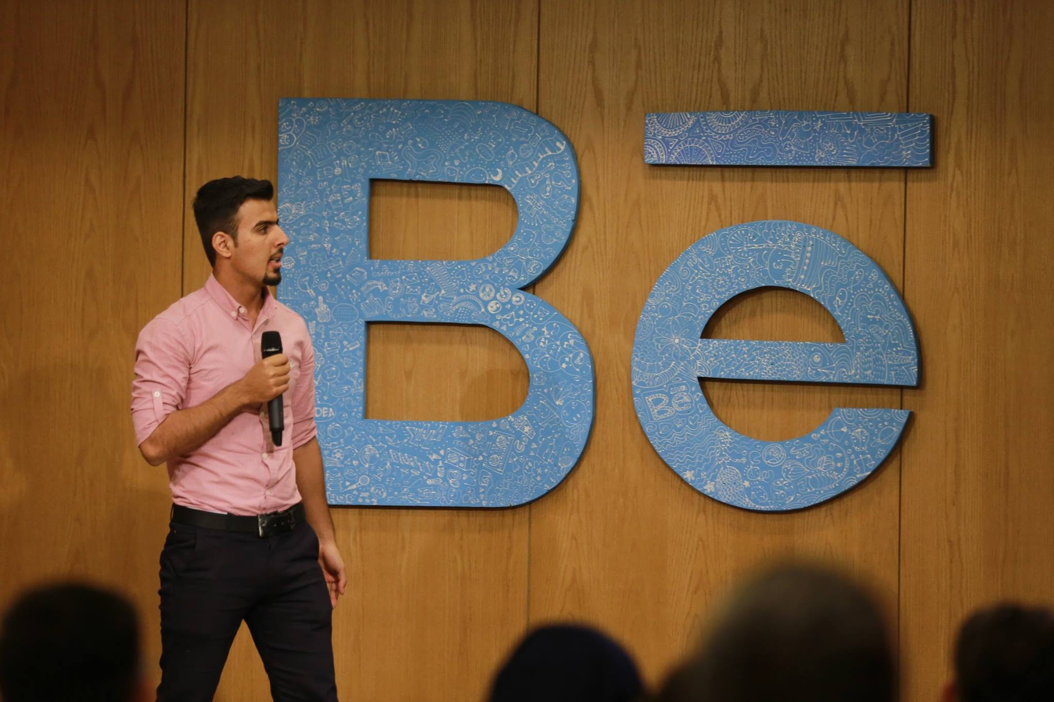 Ahmed Kadhim presenting at an Adobe Bēhance Portfolio Review event, Baghdad